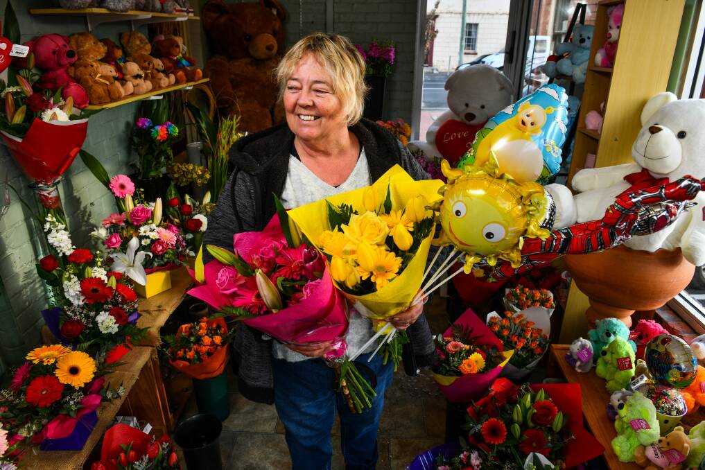 CELEBRATING: Sharon Wilcox in her International Flowers and Balloonland store. Picture: Scott Gelston