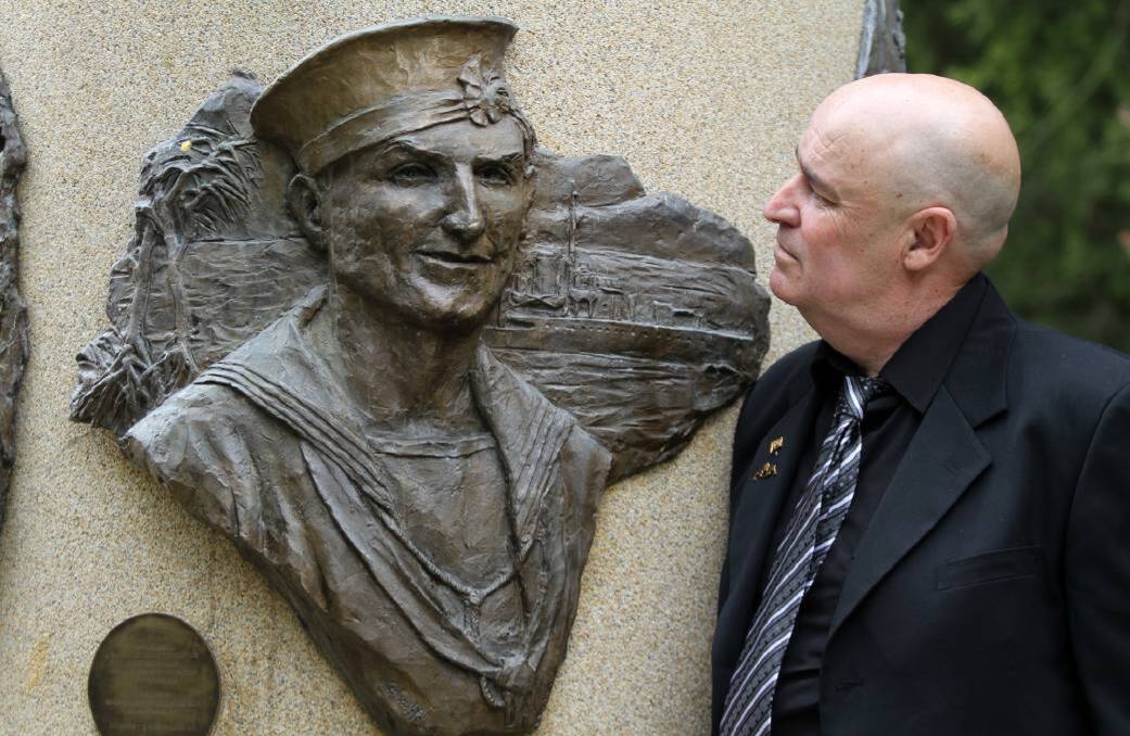 LEGACY: Garry Ivory, Ordinary Seaman Edward 'Teddy' Sheean's nephew, at his Latrobe memorial. A merits review will determine if Sheean should be awarded the Victoria Cross. Picture: File