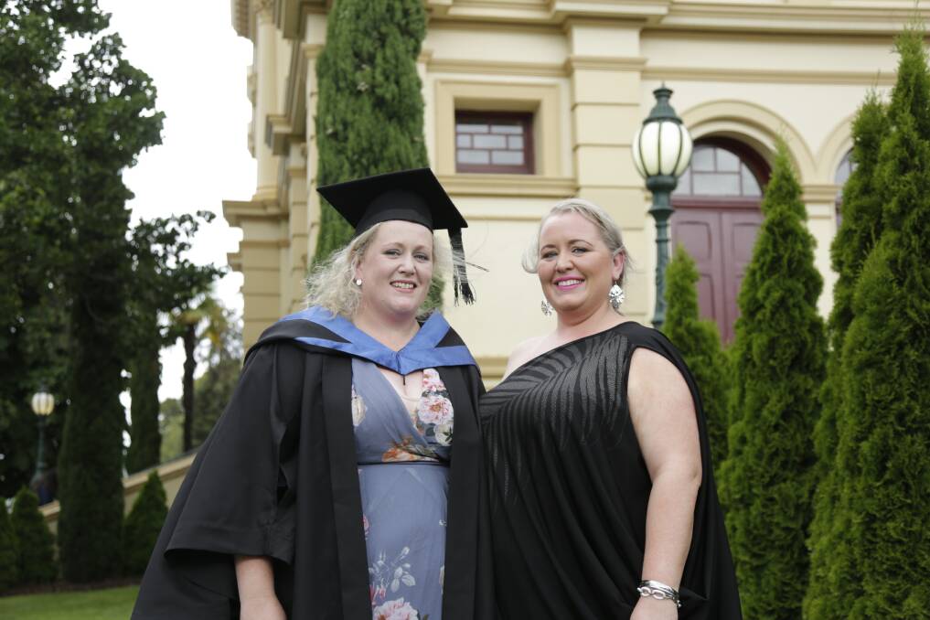 TEAM WORK: Natalie and Rebecca Lyons both graduated from UTAS at the weekend. Picture: Matt Dennien