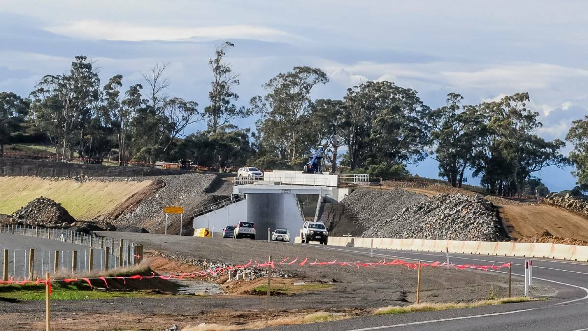 Roadworks on the Midland Highway. In December, the Kingborough council built what it said was the first Tasmanian road from soft plastics, recycled glass and used printer toner. Picture: Neil Richardson