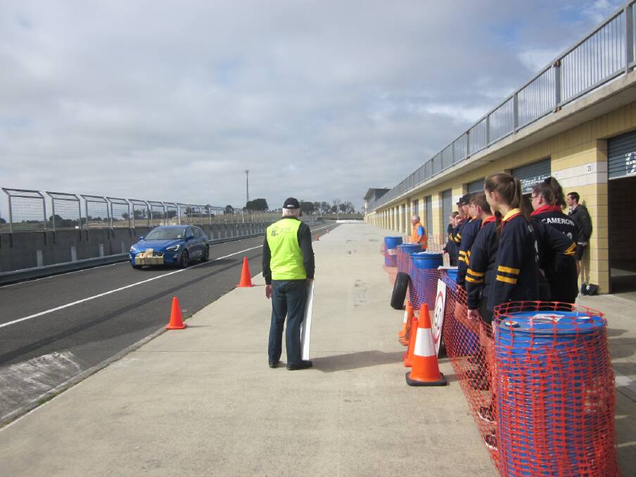 Students observing a stopping distances demonstration as part of the Rotary Youth Driver Awareness program at Symmons Plains this month. Pictures: Supplied