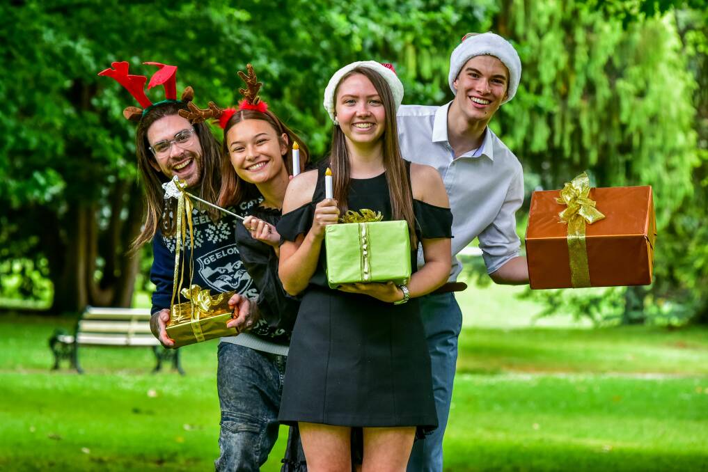 Carols by Candlelight performers Matthew Garwood Nikia Breen, Saki White and Tarrant Edwards get in the giving spirit. Picture: Neil Richardson