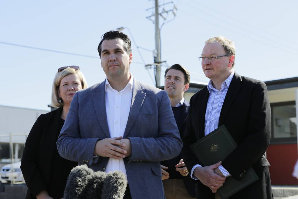 Federal Housing Minister Michael Sukkar and his state counterpart Roger Jaensch speak to media with Bass MHR Bridget Archer and Senator Jonathon Duniam after signing an agreement to wipe the state's historical housing debt in Launceston. Pictures: Matt Dennien