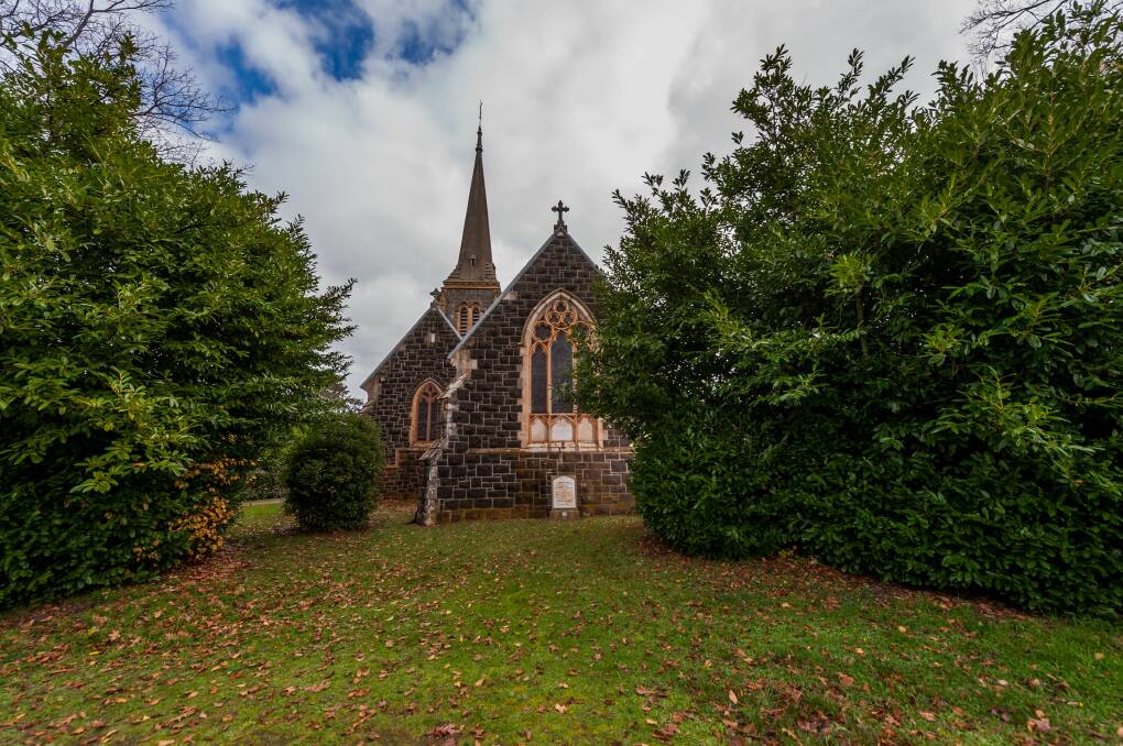 OFF THE MARKET: St Mary's Church, Hagley, showing the grave of Tasmania's first premier Sir Richard Dry. The church is one of 76 slated for sale. Picture: Phillip Biggs 