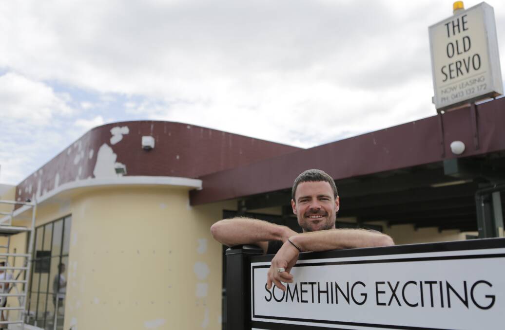 BUILDING EXCITEMENT: James Westley at the old Lilydale service station site he is working to revitalise. Picture: Matt Dennien