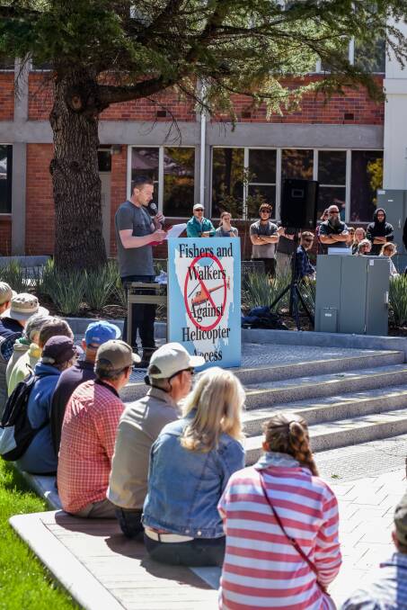 Fishers And Walkers Against Helicopter Access spokesperson Brett Smith addressing the crowd on Sunday at Launceston's Civic Square. Picture: Neil Richardson.