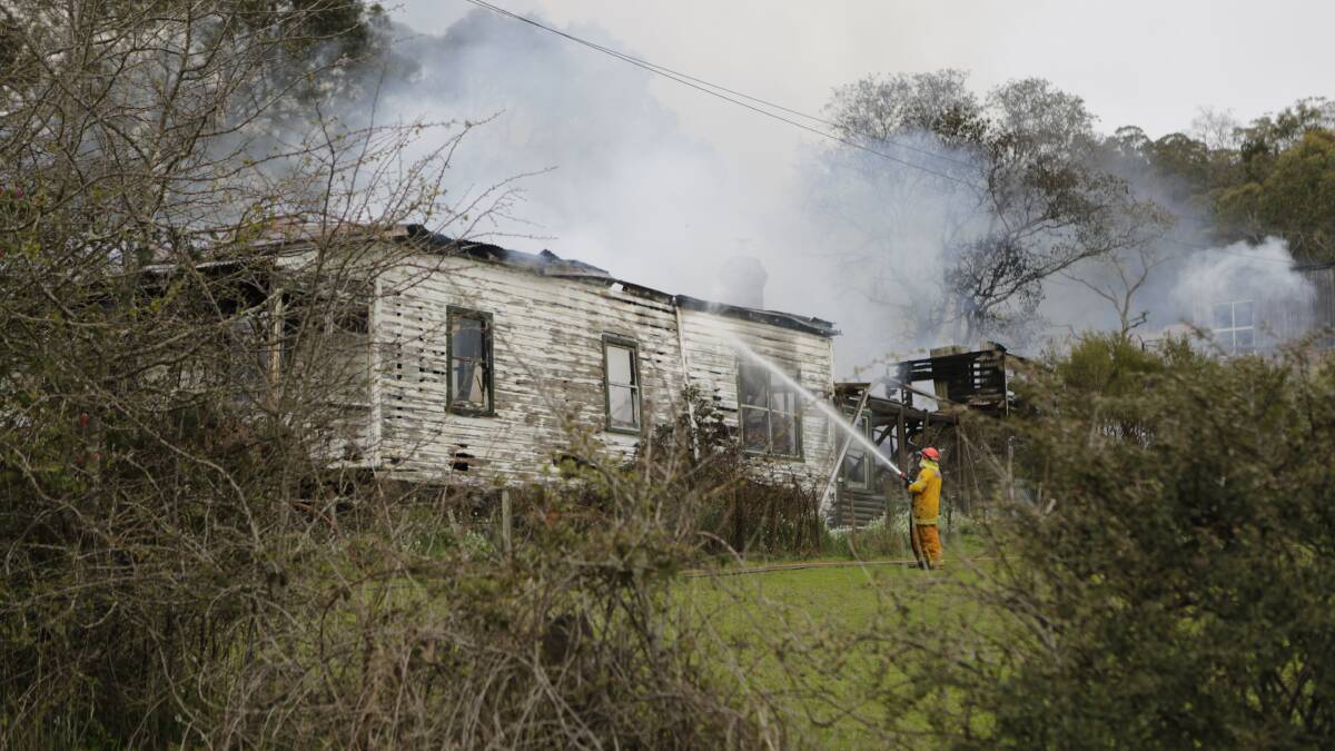 Firefighters battle the house fire on Rowella Road, Sidmouth. Pictures: Matt Dennien