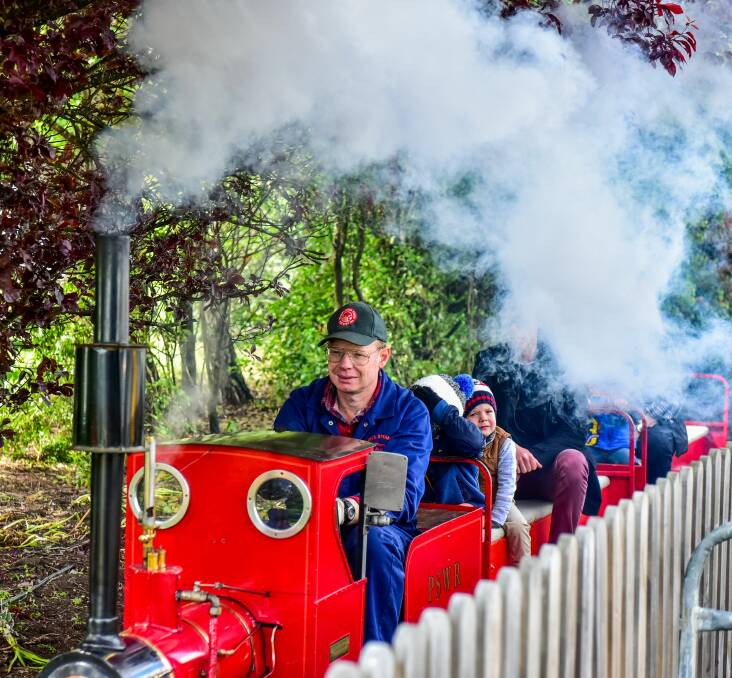 MOTORING ON: Pearn's Steam World train driver Dale Fitch takes visitors for a joy ride during their annual Steam Up event. Picture: Neil Richardson