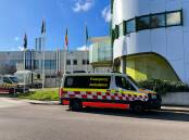 Crisis: Ambulance bays overflowed at John Hunter Hospital on Thursday when there were no available vehicles to respond to emergencies. Picture: Jonathan Carroll