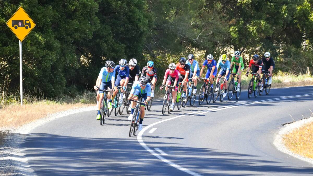 Surging: The lead pack head into finish the first lap of the Oceania Road Cycling Championships elite and under 23 road race. Picture: Simon Sturzaker.