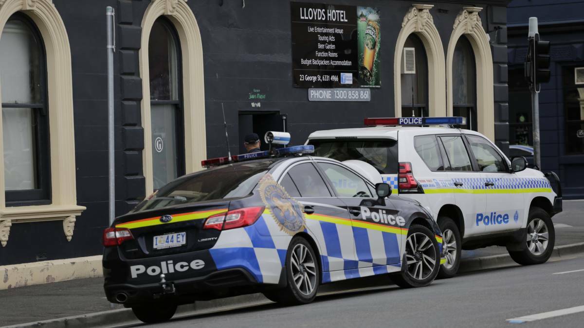 Police vehicles outside Lloyds Hotel in Cimitiere St on November 13, 2019.