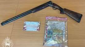 Police say a shotgun, nearly $35,000 in cash, and the drug ice were found after a raid at a Summerhill home Picture Tasmania Police 