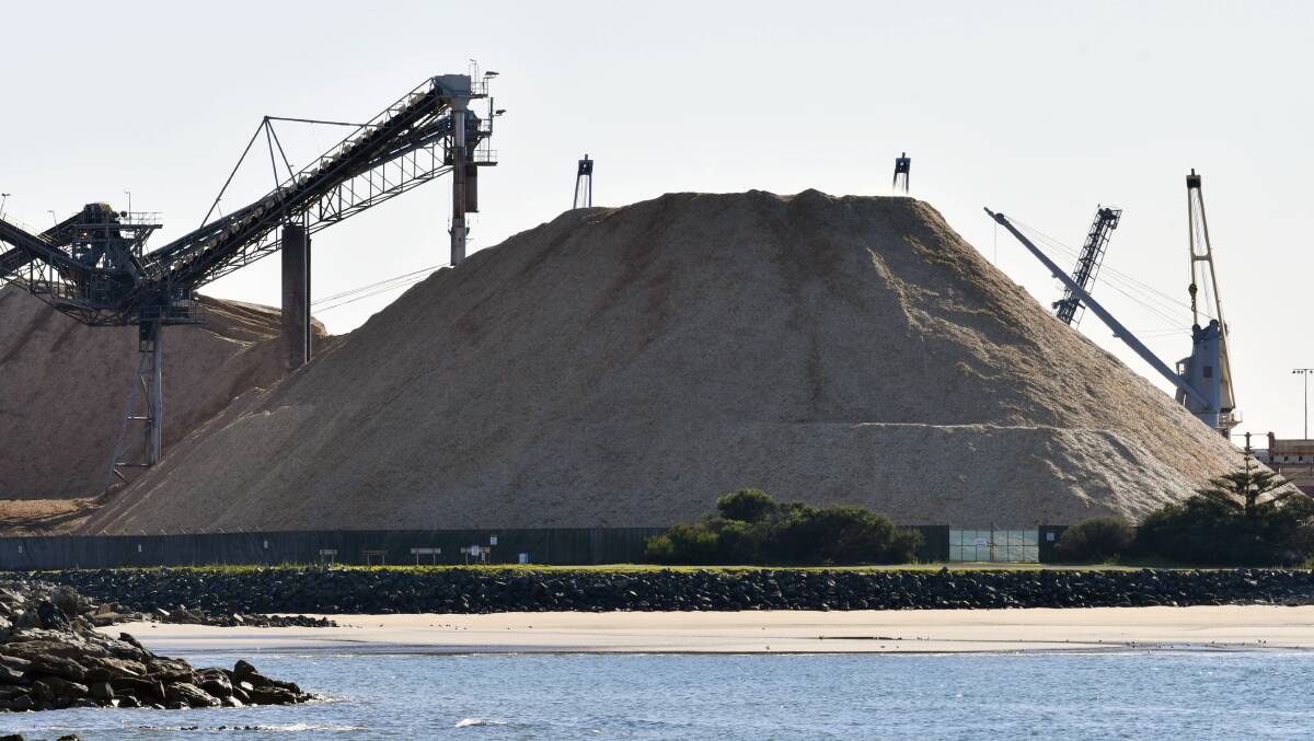 REDUCED: The woodchip pile at the Burnie Port. Quotas are down about 40 per cent due to economic conditions.