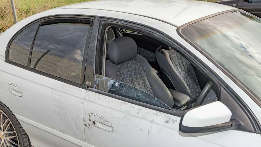 The white Holden Commodore in which two young men were seated when robbed at gunpoint by Zane Andrew Henderson 