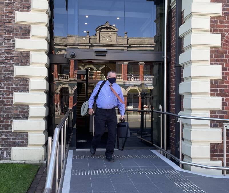 State Forensic Pathologist Dr Donald Ritchey leaving the Supreme Court in Launceston on Tuesday.