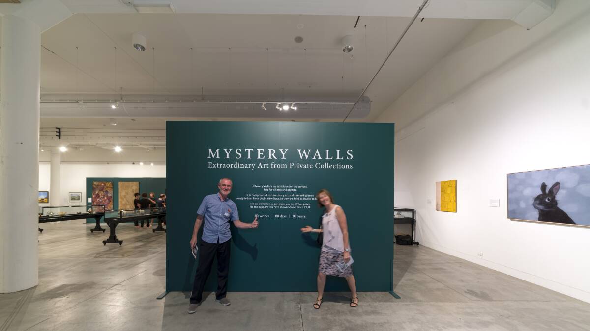 UNVEILED: Launceston mayor Albert van Zetten and his wife Lyndle explore Mystery Walls at the Queen Victoria Museum at Inveresk. Picture: Supplied/ StGiles
