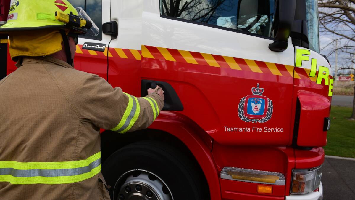 Tasmanian Fire Service crews patrol bushfire near George Town
