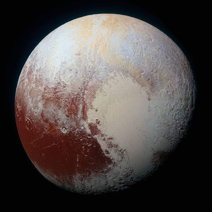 SPACE: Enhanced colour global view of Pluto, taken when NASAs New Horizons spacecraft was 450,000 kilometres away. Picture: NASA/JHUAPL/SwRI
