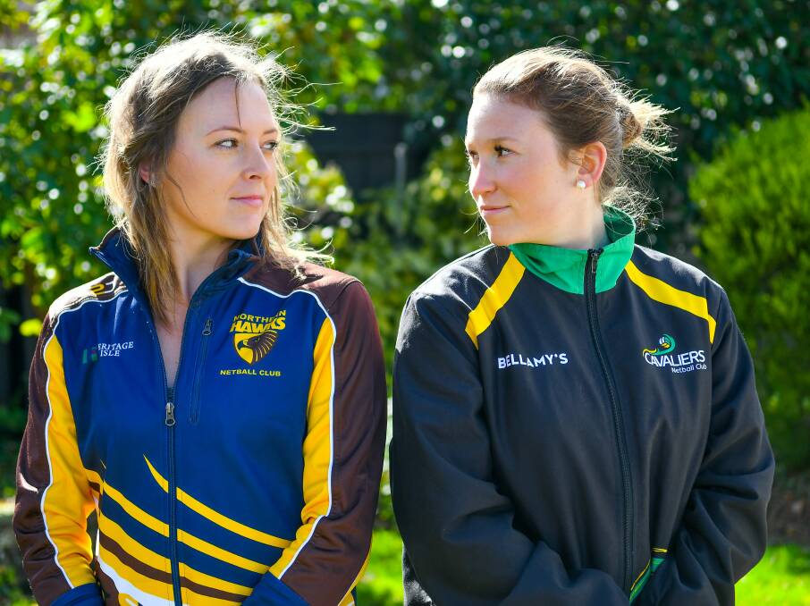 GLOVES OFF: Rival captains Ashton Whiley, of Northern Hawks, and Kate Gibson, of
Cavaliers, ahead of netball's State League preliminary final. Picture: Scott Gelston