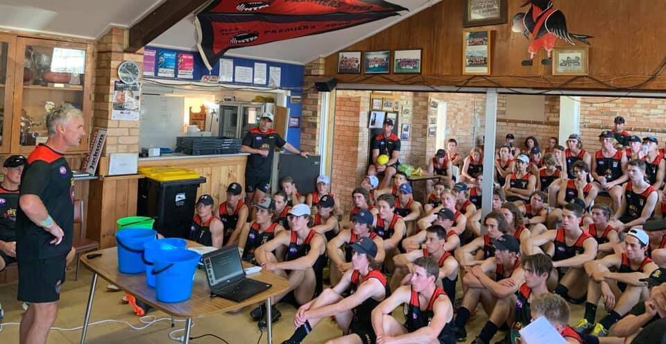 LISTEN UP: Fletcher addresses the group of Tasmanian Devils hopefuls during this month's preseason camp in Campbell Town before the list is culled from 70 to 50. 