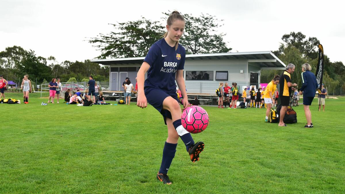 MY DREAM: Lilian Reynolds practices her ball skills for Female Football Week on Sunday. Picture: Neil Richardson
