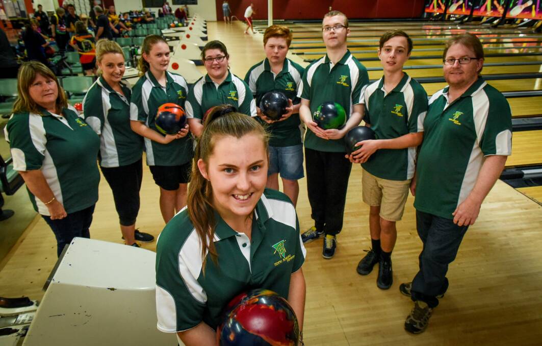 STRIKE: Sarah Pennicott stands out as the state's premier junior ten-pin bowling talent among Tasmanian teammates. Picture: Paul Scambler
