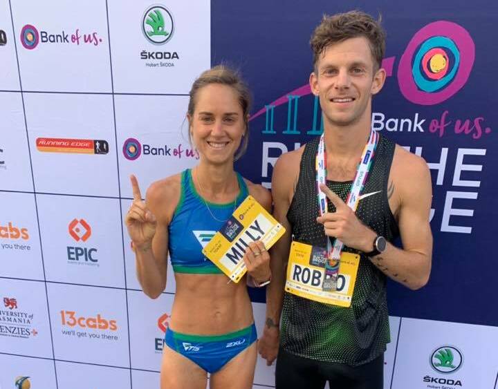 WINNERS: Milly Clark and Brett Robinson celebrate their Hobart Run the Bridge efforts on Sunday. Picture: Supplied