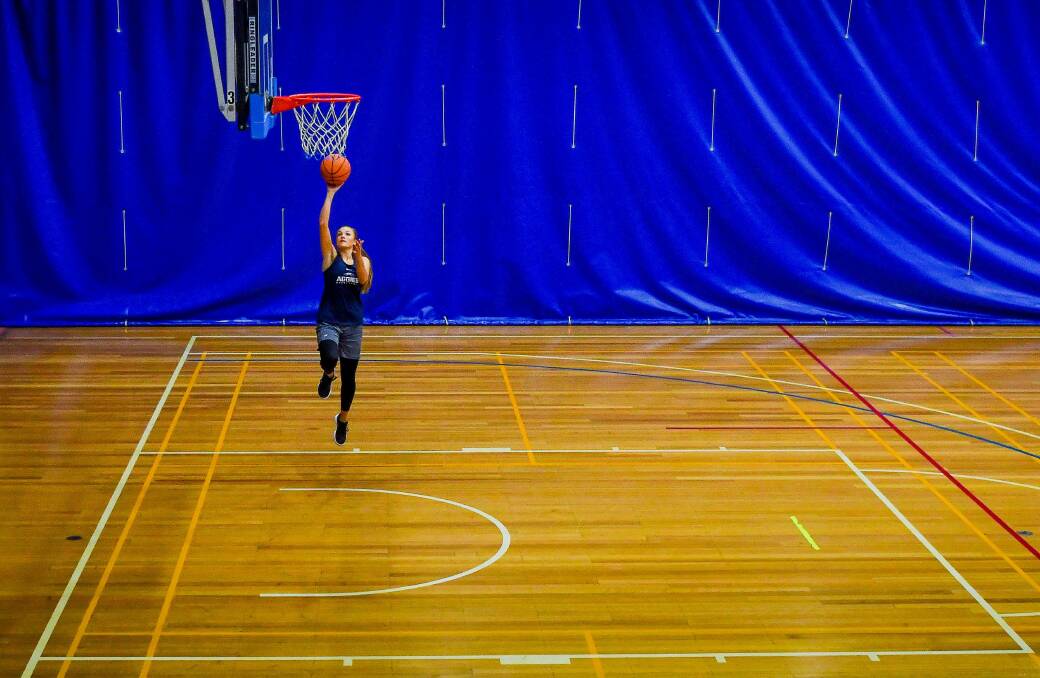 HOME SWEET HOME: Olivia West heads back inside Elphin Sports Centre to bang the boards from where it all started for the Launceston basketball hopeful. Pictures: Scott Gelston