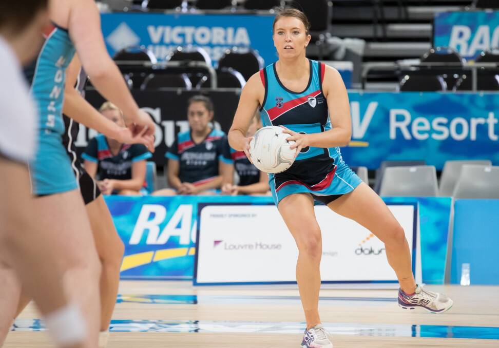 DECISIONS: Rainbow holds onto the ball in midcourt in a Netball Victoria 2016 final for club side Monash University Storm. Picture: Supplied