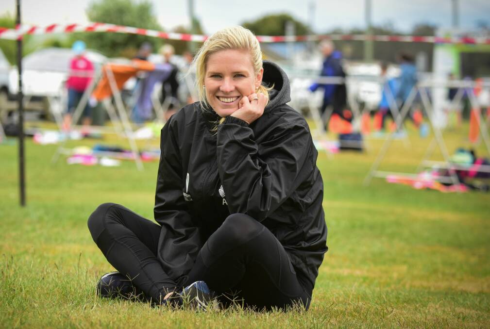 OBSERVER: Paralympian Kate Doughty watches the Launceston women's only triathlon from the sidelines at Beauty Point on Saturday. Picture: Paul Scambler