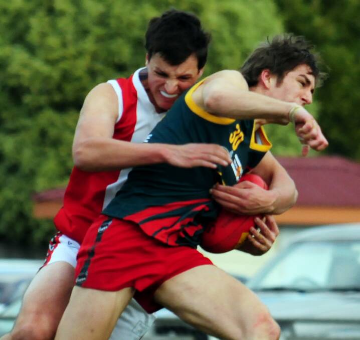 GOTCHA: George Town's Toby Nankervis in a tackle. Picture: Neil Richardson