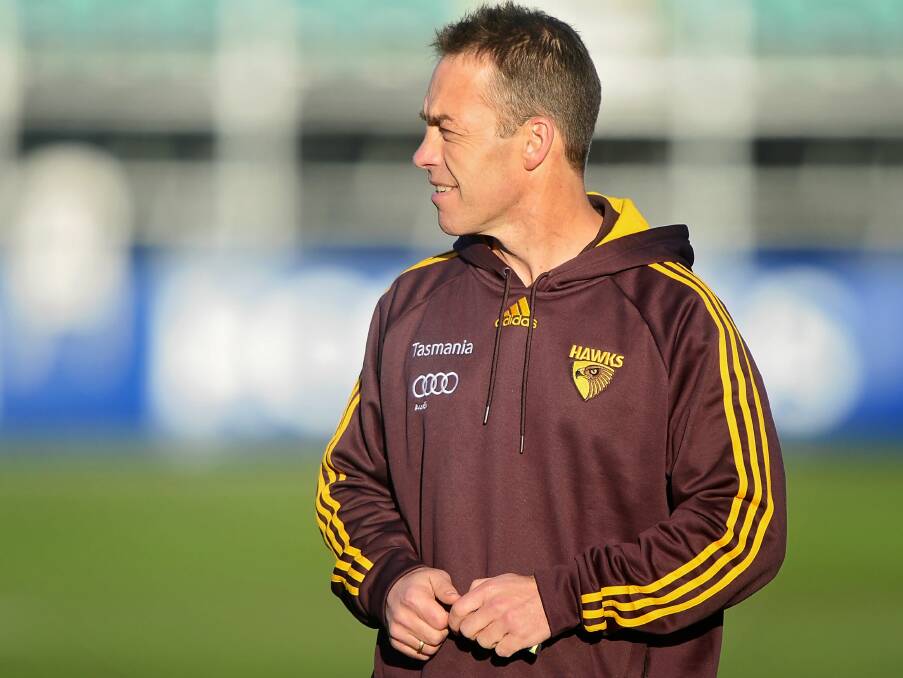 CONTEMPLATION TIME: Hawks four-time premiership coach Alastair Clarkson reflects during his side's last session before Saturday's game.