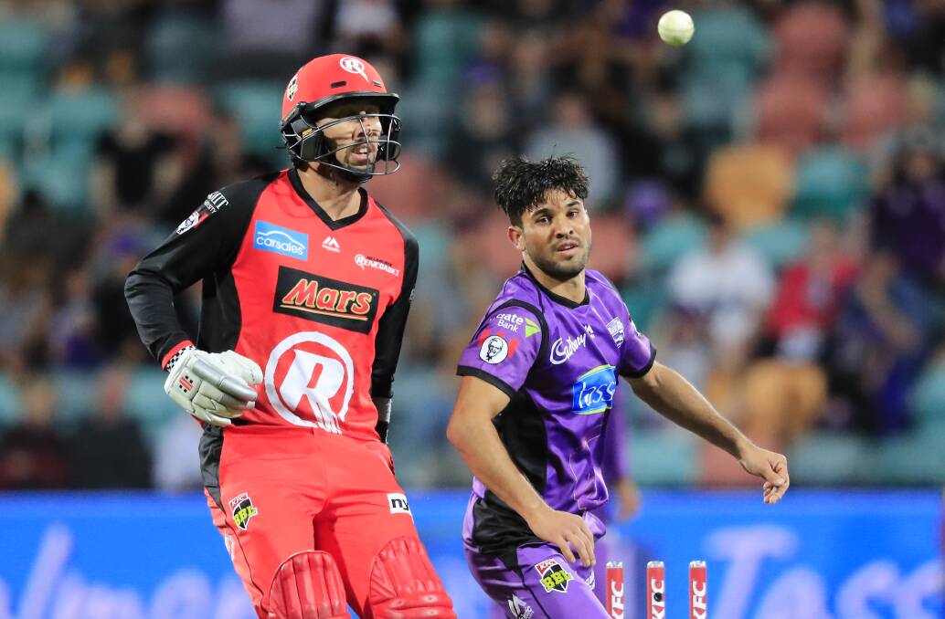 COME IN SPINNER: Hobart Hurricanes leggie Qais Ahmad floats one down the wicket during the Bellerive Oval clash last season against Melbourne Renegades. Picture: AAP