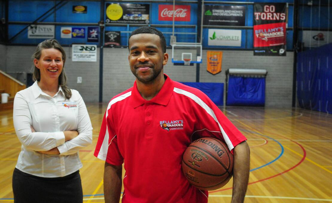 I'M HERE: Launceston Tornadoes chair Janie Finlay welcomes new club coach Derrick Washington to the home Elphin Sports Centre court on Thursday. Pictures: Paul Scambler