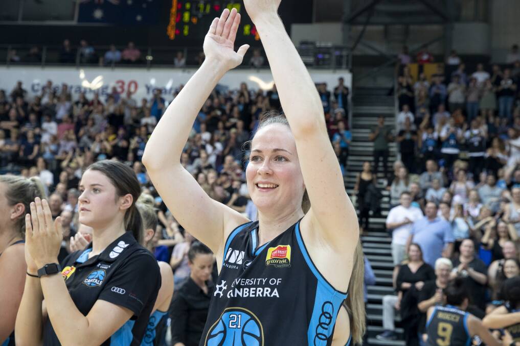 CELEBRATIONS: Keely Froling thanks the support of the partisan Canbera Capitals' crowd after securing back-to-back WNBL championships on Saturday night. Picture: Sitthixay Ditthavong
