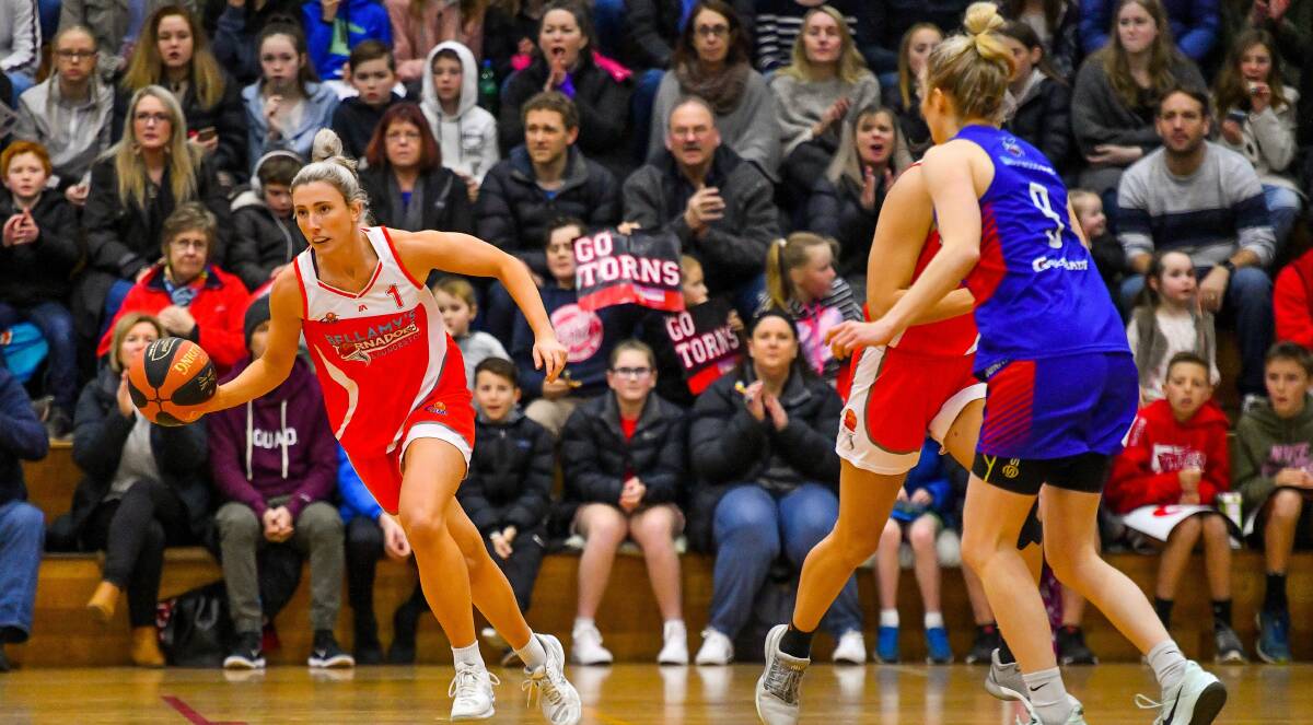 POWERING AWAY: Launceston Tornadoes star MVP Lauren Nicholson looks to charge up court during Saturday night's stirring preliminary final win against Nunawading Spectres at Elphin Sports Centre. Picture: Scott Gelston