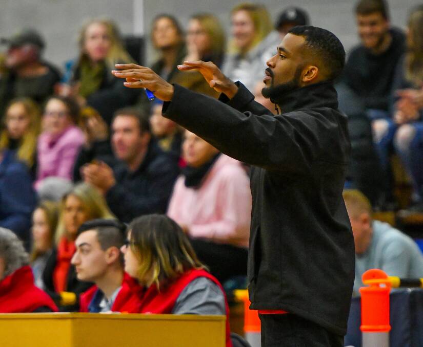 STAND UP: Launceston Tornadoes coach Derrick Washington takes control ahead of the grand final qualifier against Nunawading.