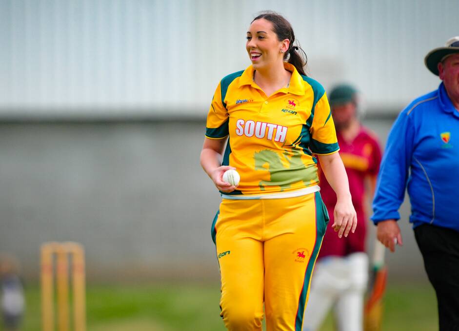 STAR: South's Lisa Battle is all smiles during a match-winning bowling spell.