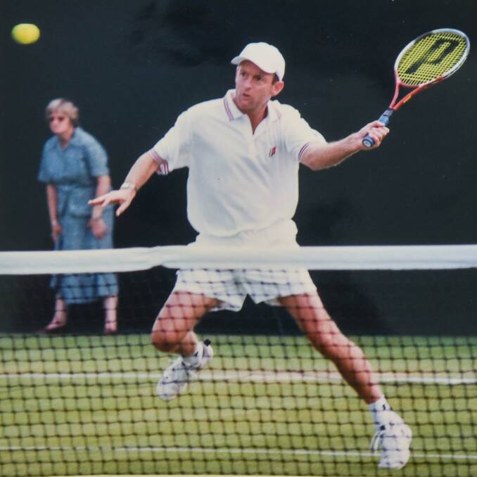 FINE TOUCH: David Macpherson stays at the net during one of his days spent in the Wimbledon doubles draw.
