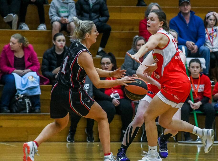 MATE FACE MATE: Former St Mary's College teammates Lauren Nicholson, for Kilsyth Cobras, and Stella Beck, for Launceston Tornadoes, meet again. Picture: Neil Richardson