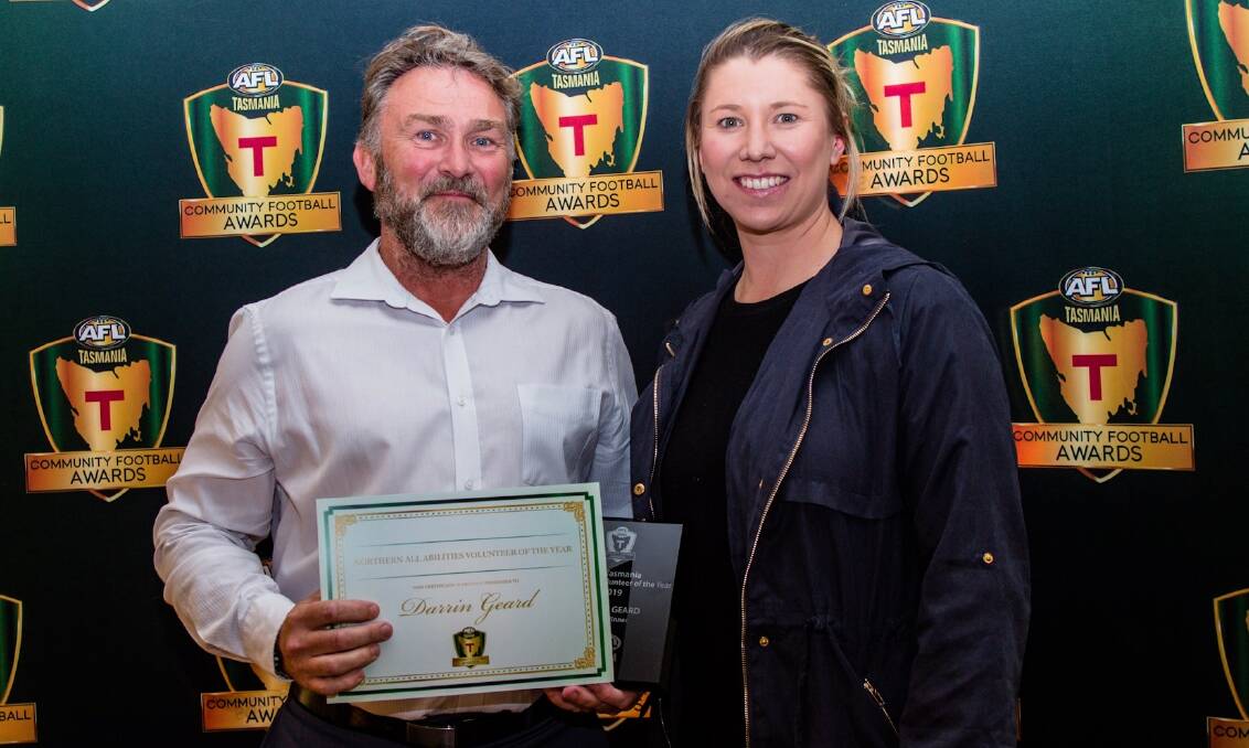APPRECIATION: Darrin Geard accepts the state all-abilities volunteer of the year honour from AFL Tasmania's Linsey Da Costa. Picture: Solstice Digital