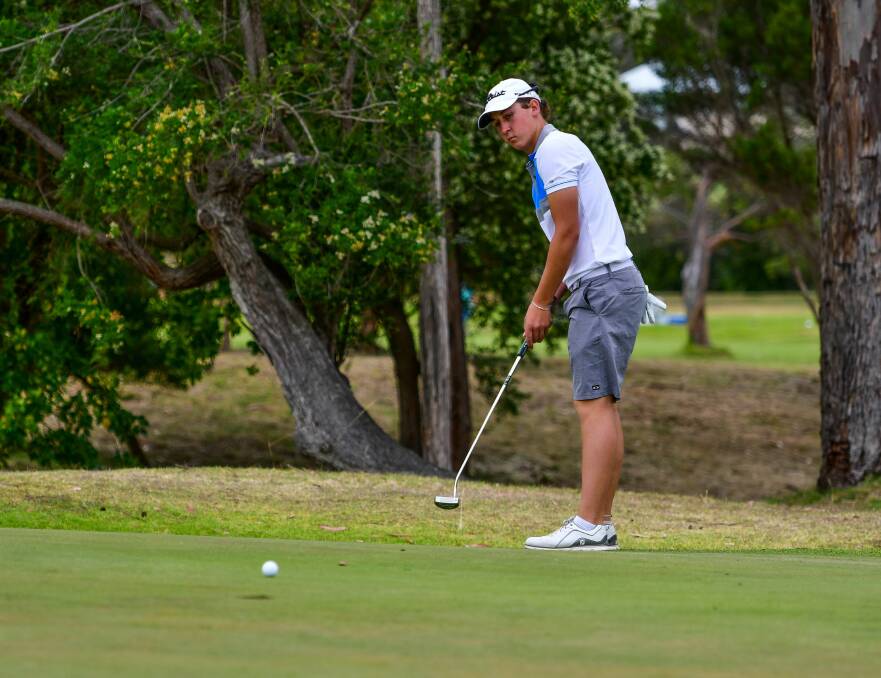 DEADEYE: Ryan Thomas lines up his putt on the green on Monday. Picture: Scott Gelston