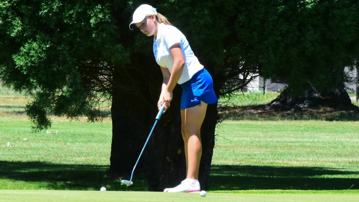 TAPPING IN: Riverside golfer Alexandra Hansen watches her putt from just on the edge of the green.