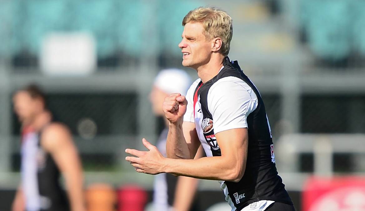 SUPERSTAR: Nick Riewoldt wins a popular poll for the Tasmania's best over Alastair Lynch.
