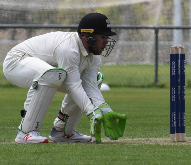 SHAKY GROUND: Greater Northern Raiders gloveman Alistair Taylor went down keeping up to the stumps and was forced off the ground and into hospital after the blow to the head on Saturday. Picture: Paul Scambler