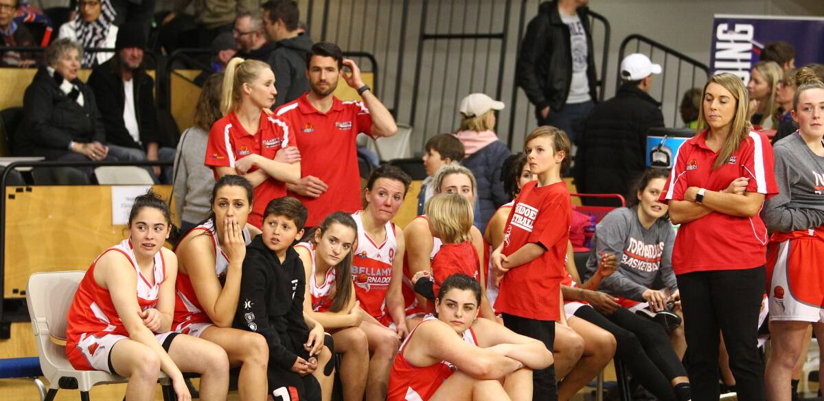 PAINFUL MEMORIES: A dejected Launceston Tornadoes squad reflects just moments after last year's SEABL grand final defeat at the hands of Bendigo Braves. Picture: Ian Wright