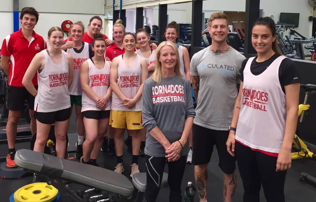SWEAT: Launceston Tornadoes local players take a break from an early preseason weights session at KFM Fitness. Picture: Supplied