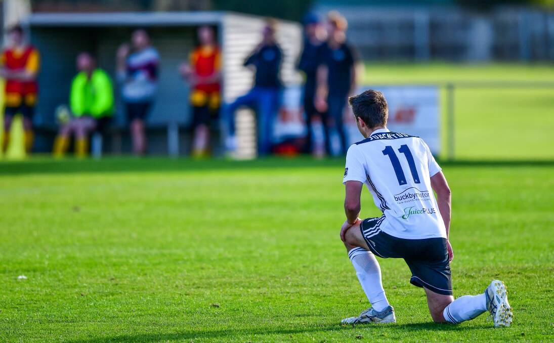 RESPECT: Noah Mies dropped to his knee after Saturday's cup loss before City retrieved a point two days later in the league. Picture: Scott Gelston