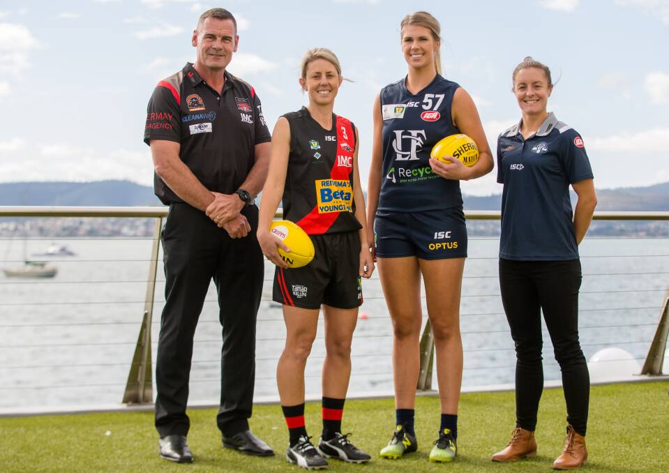 BRING IT ON: North Launceston coach Dean Smith, Bombers captain Jodie Clifford join Blues ruck Abbey Green and Launceston coach Angela Dickson ready to go at the TSLW season launch last month in Hobart. Picture: Solstice Digital