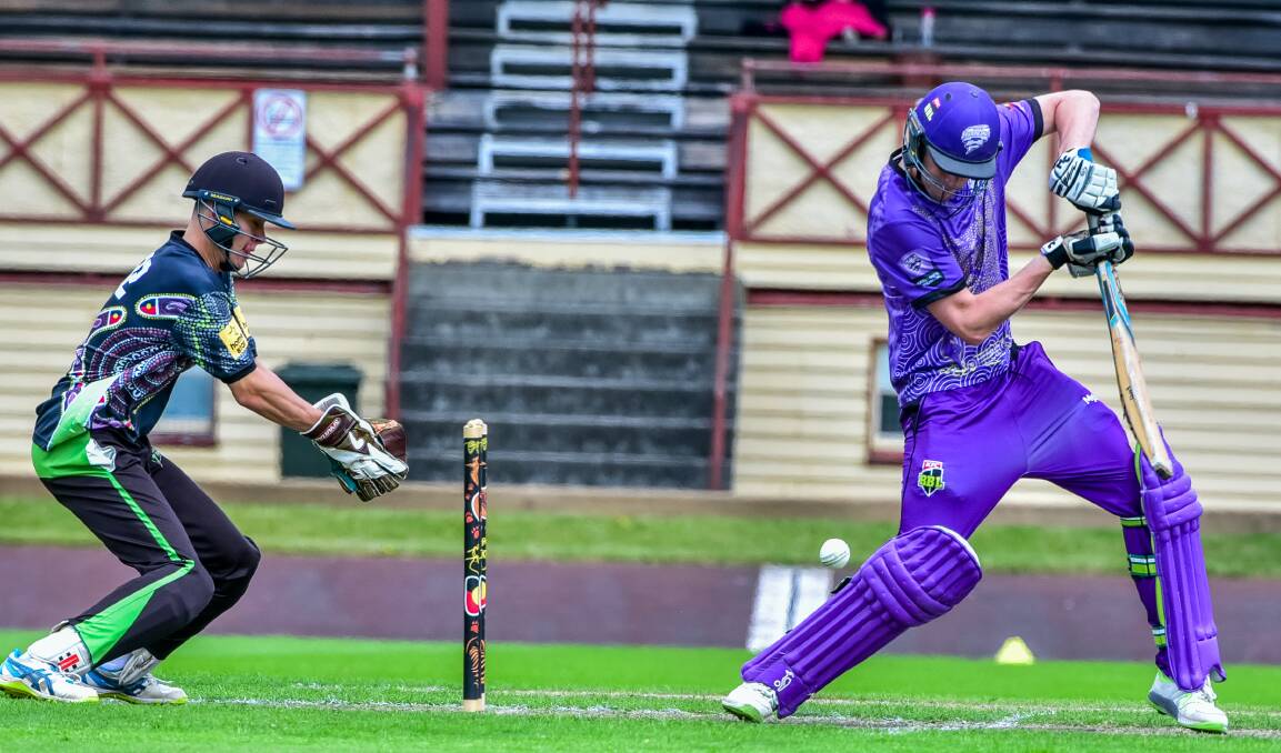 HEAD DOWN: Hobart Hurricanes Indigenous XI captain Rhys Ward defends against Sydney Thunder counterparts in Latrobe. Picture: Neil Richardson